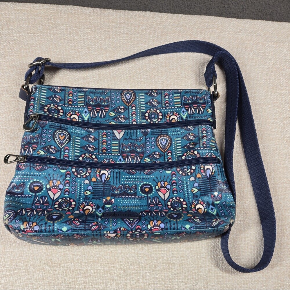 Sakroots Crossbody Bag Teal Floral Pattern Pockets Adjustable Strap Artist Boho